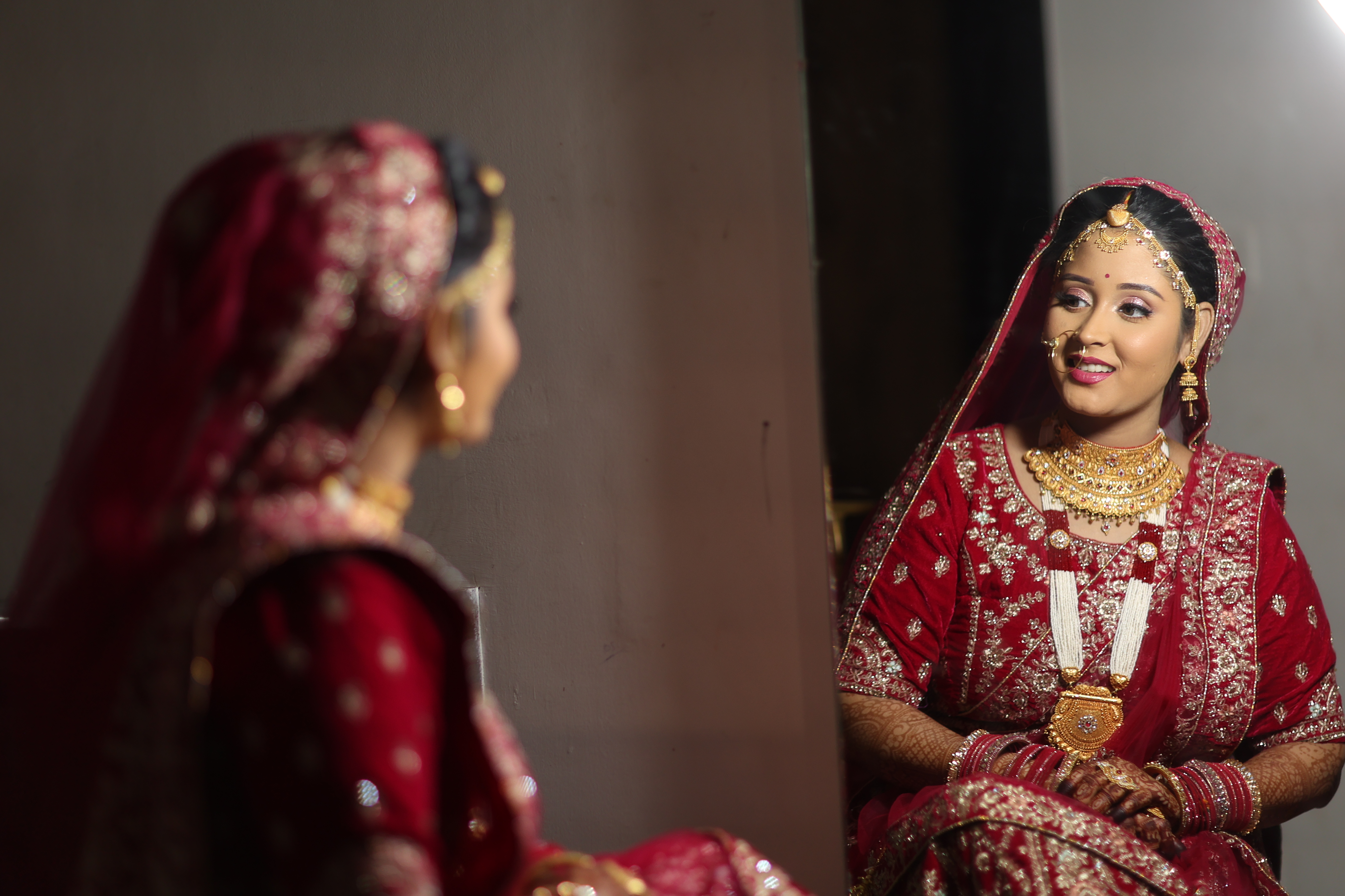 Wedding rings on a rustic wooden table