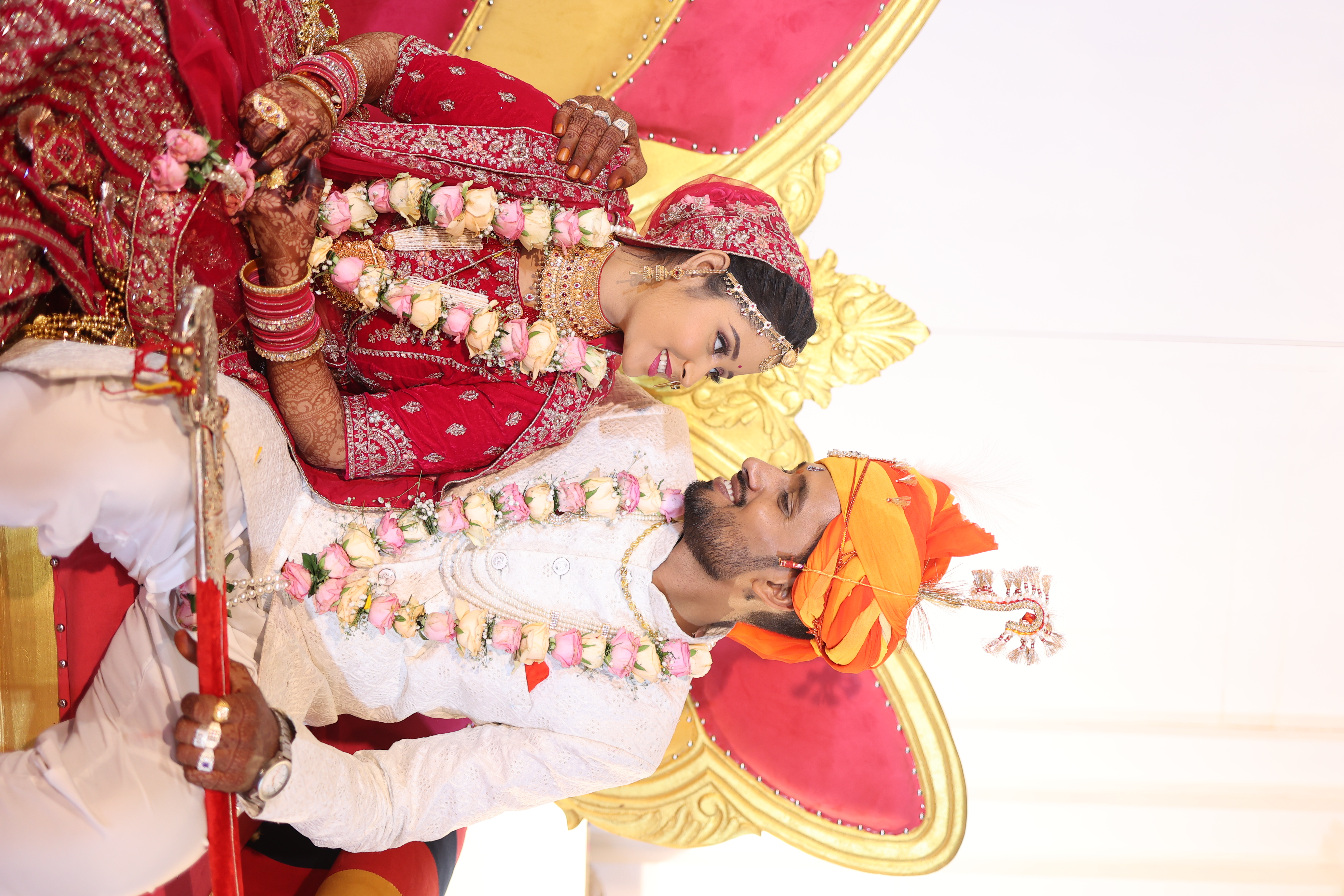 Bride smiling with bouquet